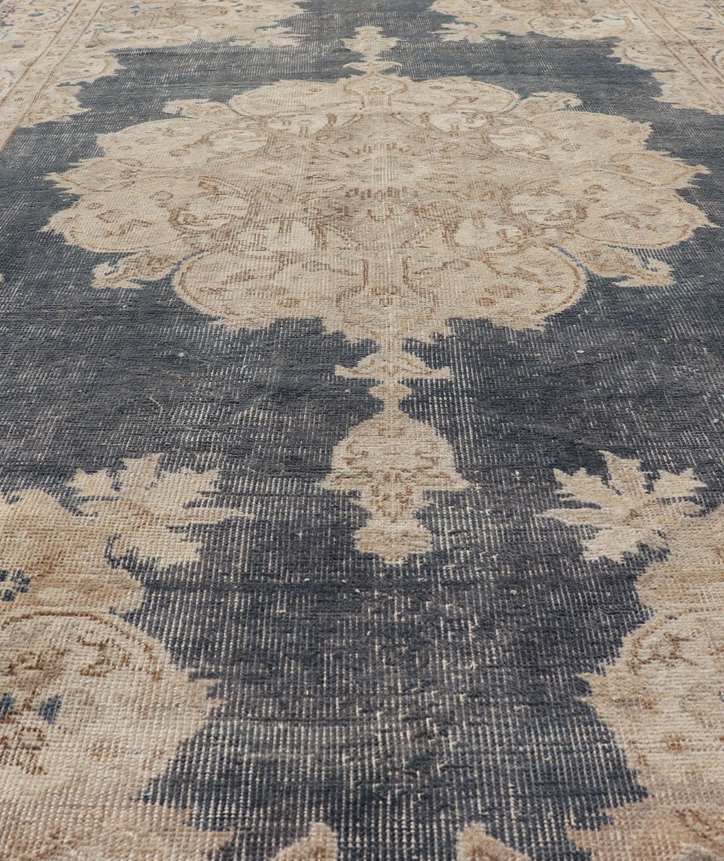Measures: 5'2 x 8'5 Distressed Turkish Carpet with Floral Design in Blue, Tan, Taupe, and Cream. Keivan Woven Arts / EN - 14975 rug/ Turkish / Vintage Mid - 20th Century This vintage Turkish carpet has been neutralized to create faded pigments w... - Keivan Woven ArtsEN - 14975 - 22830