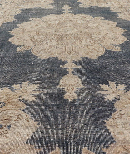 Measures: 5'2 x 8'5 Distressed Turkish Carpet with Floral Design in Blue, Tan, Taupe, and Cream. Keivan Woven Arts / EN - 14975 rug/ Turkish / Vintage Mid - 20th Century This vintage Turkish carpet has been neutralized to create faded pigments w... - Keivan Woven ArtsEN - 14975 - 22830