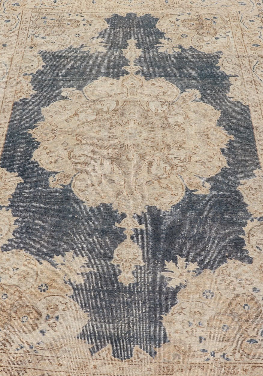 Measures: 5'2 x 8'5 Distressed Turkish Carpet with Floral Design in Blue, Tan, Taupe, and Cream. Keivan Woven Arts / EN - 14975 rug/ Turkish / Vintage Mid - 20th Century This vintage Turkish carpet has been neutralized to create faded pigments w... - Keivan Woven ArtsEN - 14975 - 22830Rug