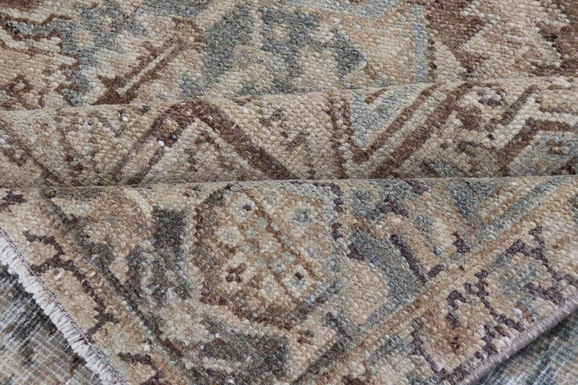 Square Antique Heriz Rug with Geometric Design in Blue's, Tan, Cream, and Brown. Keivan Woven Arts / rug EN - 15000, country of origin / type: Iran / Heriz, circa 1930 Measures: 7'6 x 8'5 This square Persian Heriz carpet bears an exqui... - Keivan Woven ArtsEN - 15000 - 23672