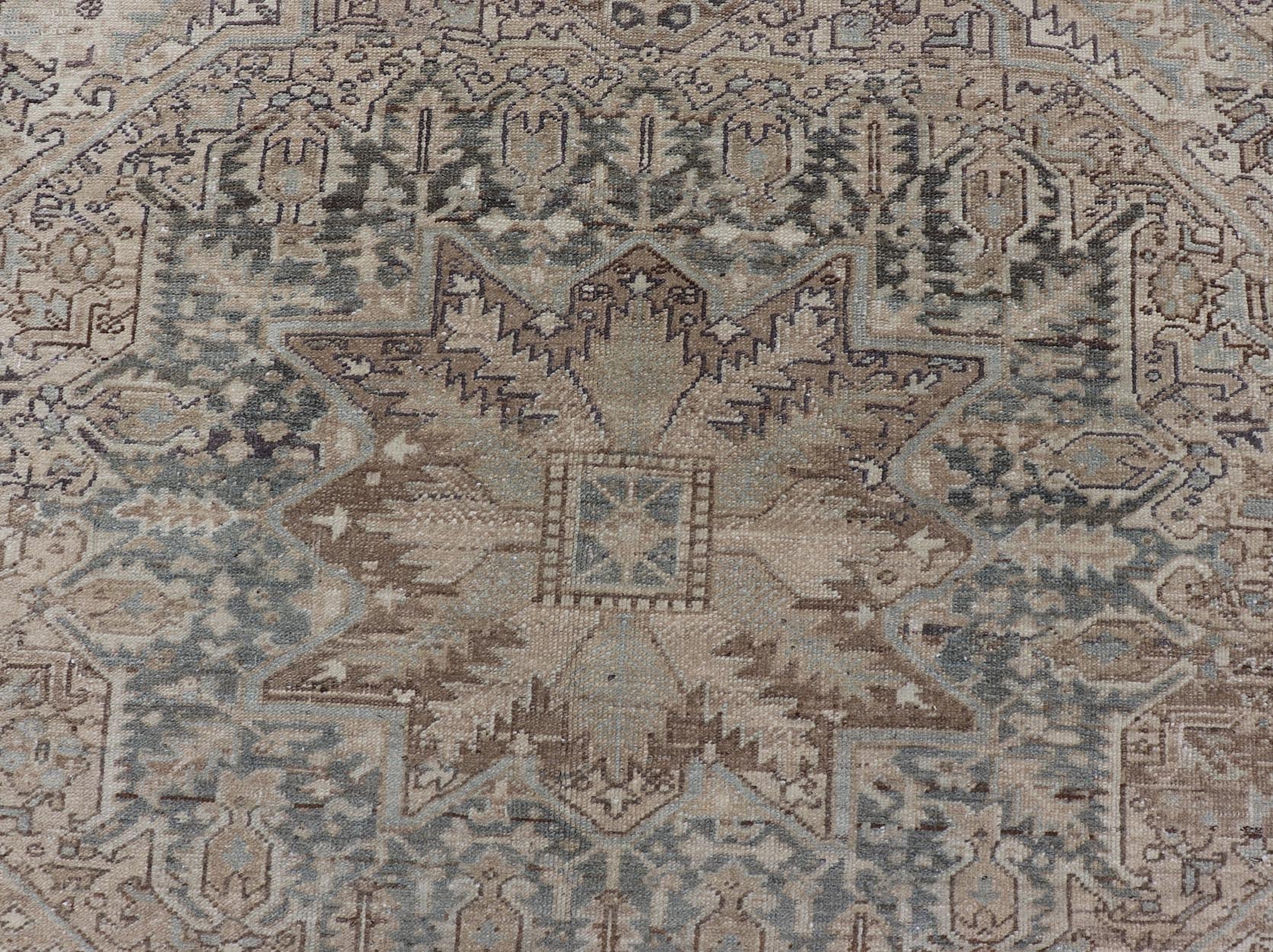 Square Antique Heriz Rug with Geometric Design in Blue's, Tan, Cream, and Brown. Keivan Woven Arts / rug EN - 15000, country of origin / type: Iran / Heriz, circa 1930 Measures: 7'6 x 8'5 This square Persian Heriz carpet bears an exqui... - Keivan Woven ArtsEN - 15000 - 23672Rug