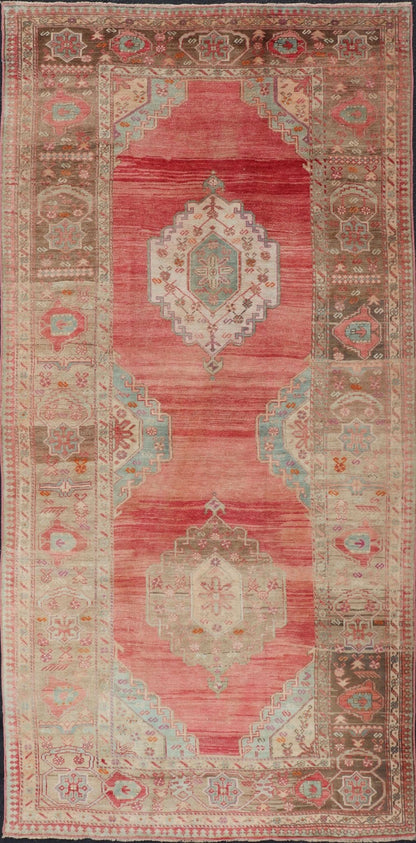 Measures: 5'4 x 11'6 Turkish Vintage Oushak Gallery with Tribal Medallions in Coral, Lt. Green & Tan. Country of origin: Turkey; Type: Oushak; Design: Tribal, Tribal Medallion; Keivan Woven Arts: rug EN - 15116. This vintage Turkish Oushak fe... - Keivan Woven ArtsEN - 15116 - 22848Rug
