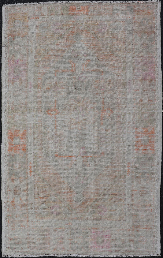 Turkish Muted Colored Oushak Rug is Subdued Medallion Design. Keivan Woven Arts / rug EN - 15128, country of origin / type: Turkey / Oushak, circa 1940 Measures: 2'7 x 4'2 This vintage Turkish Oushak carpet from Turkey boasts a center medallion in... - Keivan Woven ArtsEN - 15128 - 23785Rug