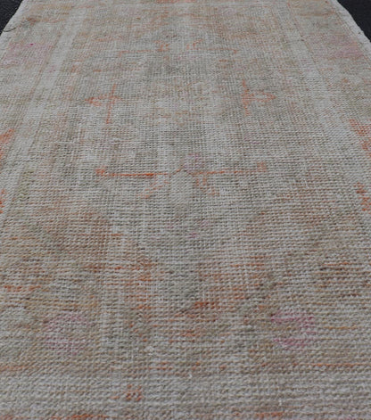 Turkish Muted Colored Oushak Rug is Subdued Medallion Design. Keivan Woven Arts / rug EN - 15128, country of origin / type: Turkey / Oushak, circa 1940 Measures: 2'7 x 4'2 This vintage Turkish Oushak carpet from Turkey boasts a center medallion in... - Keivan Woven ArtsEN - 15128 - 23785Rug