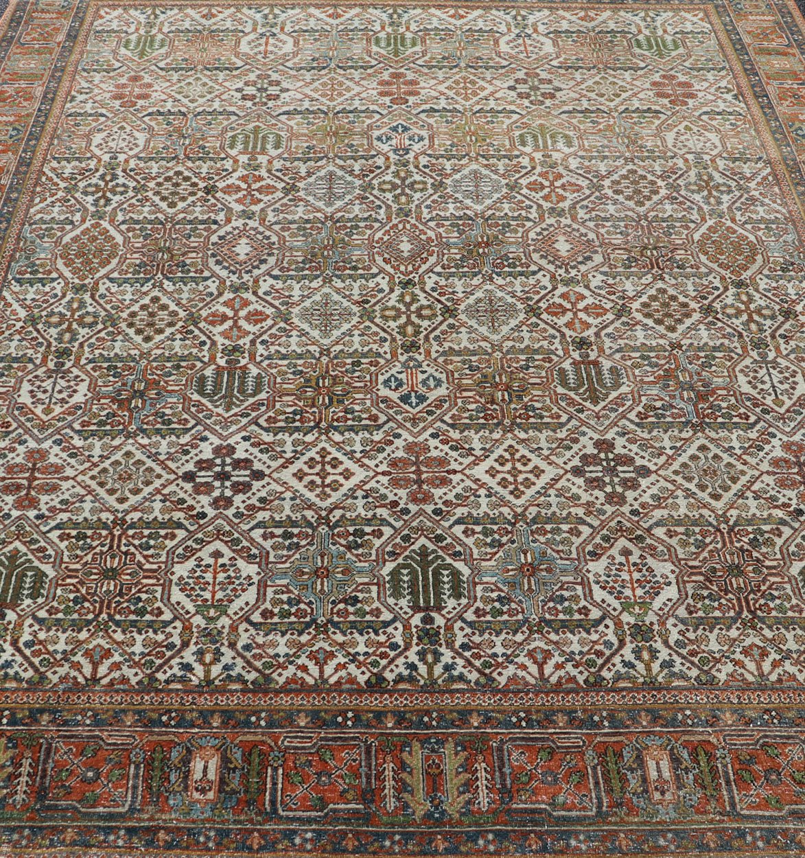 Measures: 7'10 x 10'9 Antique Persian Joshegan Rug in Ivory Background With Blue, Green, & Copper. Keivan Woven Arts/ rugEN - 15157, country of origin / type: Iran / Joshegan, circa 1920 Antique Persian Joshegan Rug in Ivory Background with co... - Keivan Woven ArtsEN - 15157 - 22608Rug