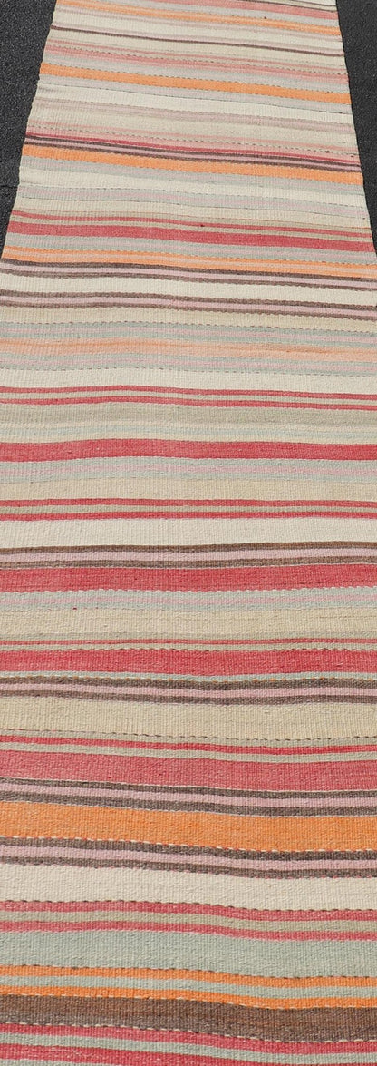 Vintage Kilim Runner with Horizontal Stripes in Pastel Vivid Colors. Keivan Woven Arts / rug EN - 15174, country of origin / type: Turkey / Kilim, circa mid - 20th century Measures: 2'8 x 13'6 Featuring a repeating horizontal stripe design, this uniq... - Keivan Woven ArtsEN - 15174 - 23595Rug