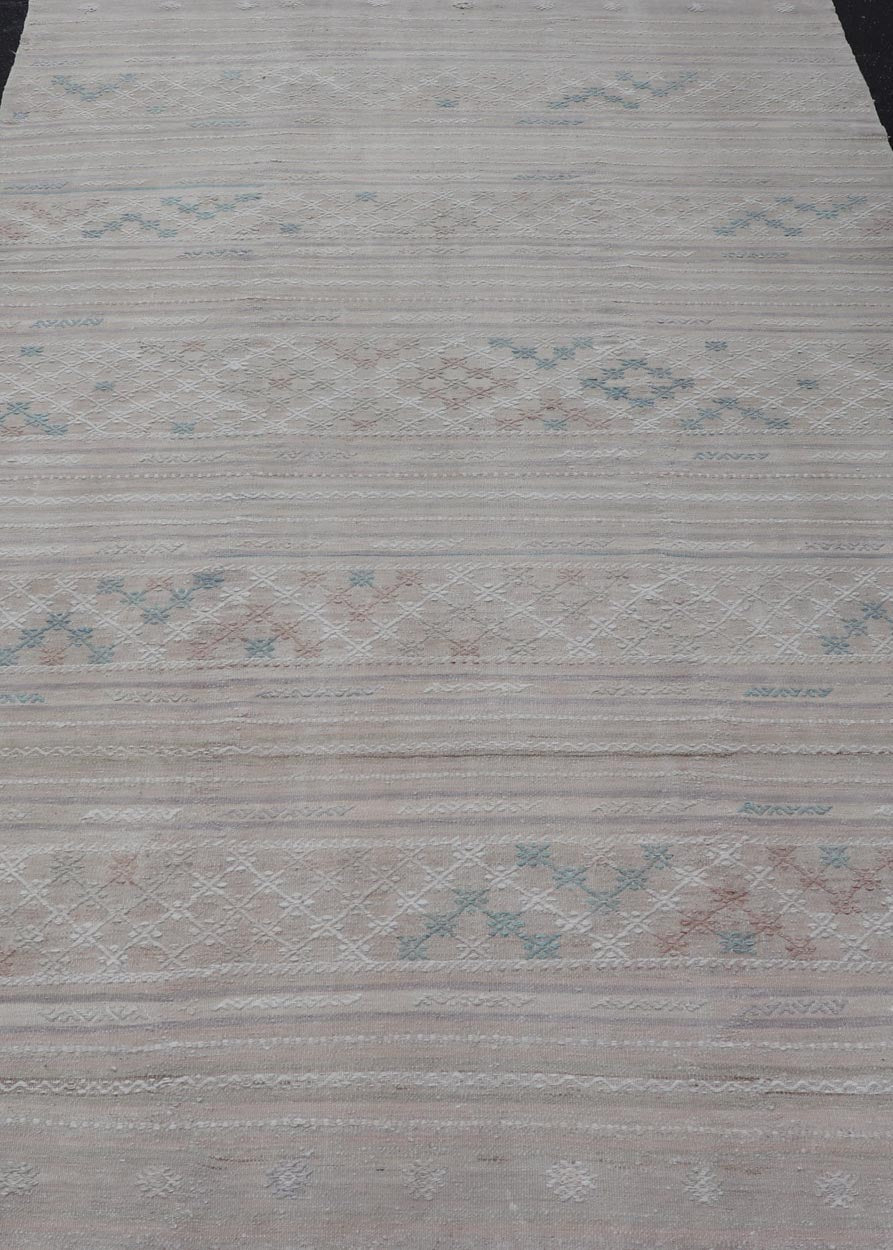 Vintage Turkish Kilim Rug with Neutral Horizontal Stripes and Geometric Designs. Keivan Woven Arts / rug EN - 15177, country of origin / type: Turkey / Kilim, circa 1950 Measures: 6'1 x 10'0 Featuring geometric shapes rendered in a repeating horiz... - Keivan Woven ArtsEN - 15177 - 23809Rug
