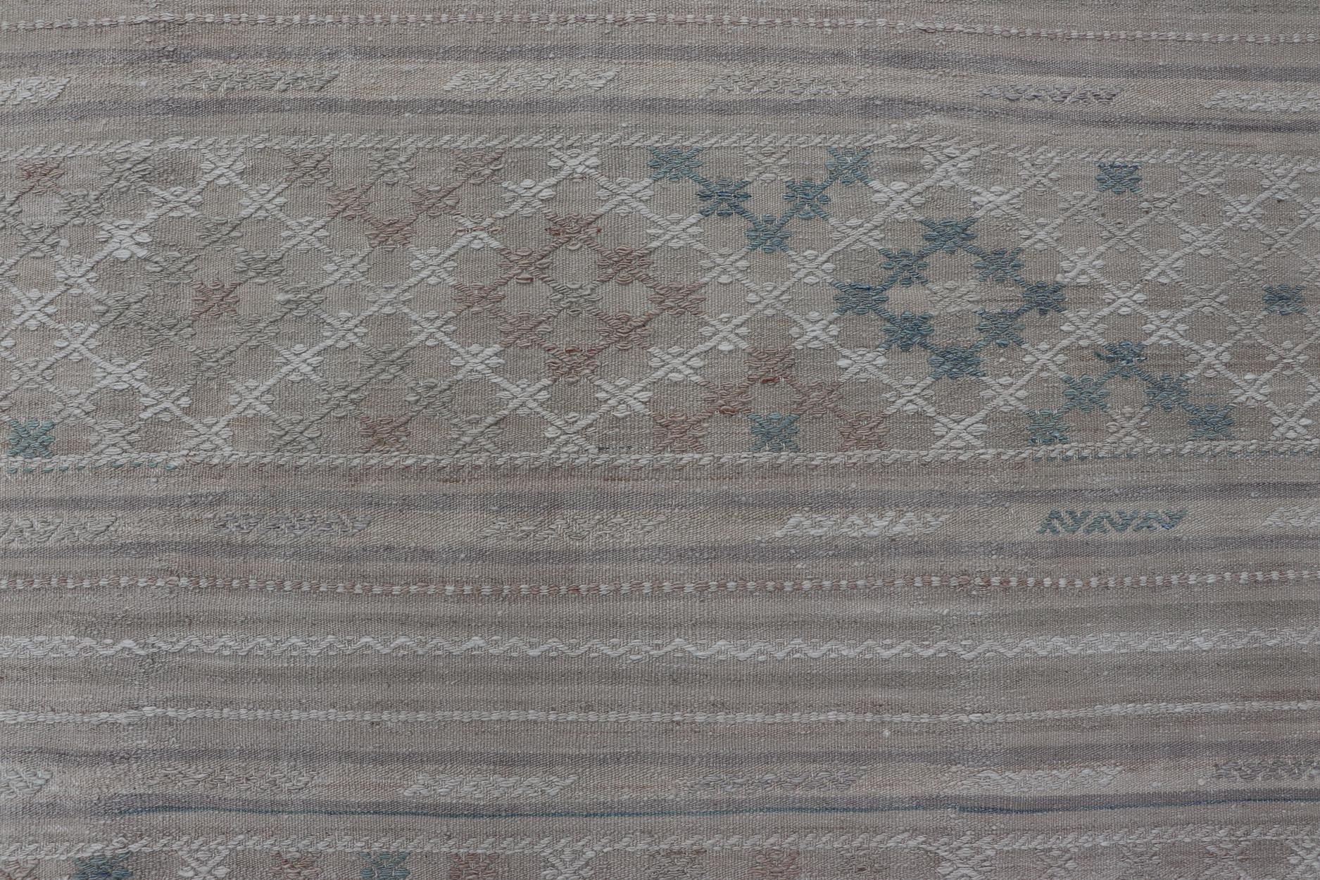 Vintage Turkish Kilim Rug with Neutral Horizontal Stripes and Geometric Designs. Keivan Woven Arts / rug EN - 15177, country of origin / type: Turkey / Kilim, circa 1950 Measures: 6'1 x 10'0 Featuring geometric shapes rendered in a repeating horiz... - Keivan Woven ArtsEN - 15177 - 23809Rug
