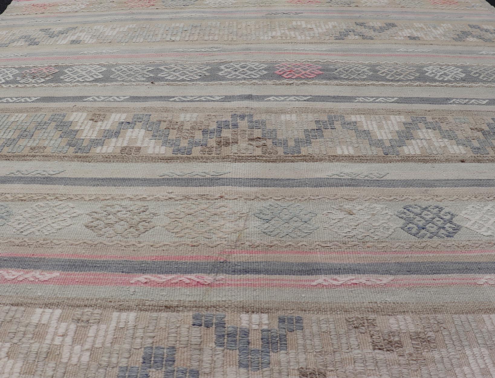 Stripes and Embroideries Turkish Flat - Weave vintage Kilim in various Muted Colors. Keivan Woven Arts / rug EN - 15178, country of origin / type: Turkey / Kilim, circa 1950 Measures: 5'4 x 5'10 This Kilim rug from Turkey features a striped ... - Keivan Woven ArtsEN - 15178 - 24031Rug