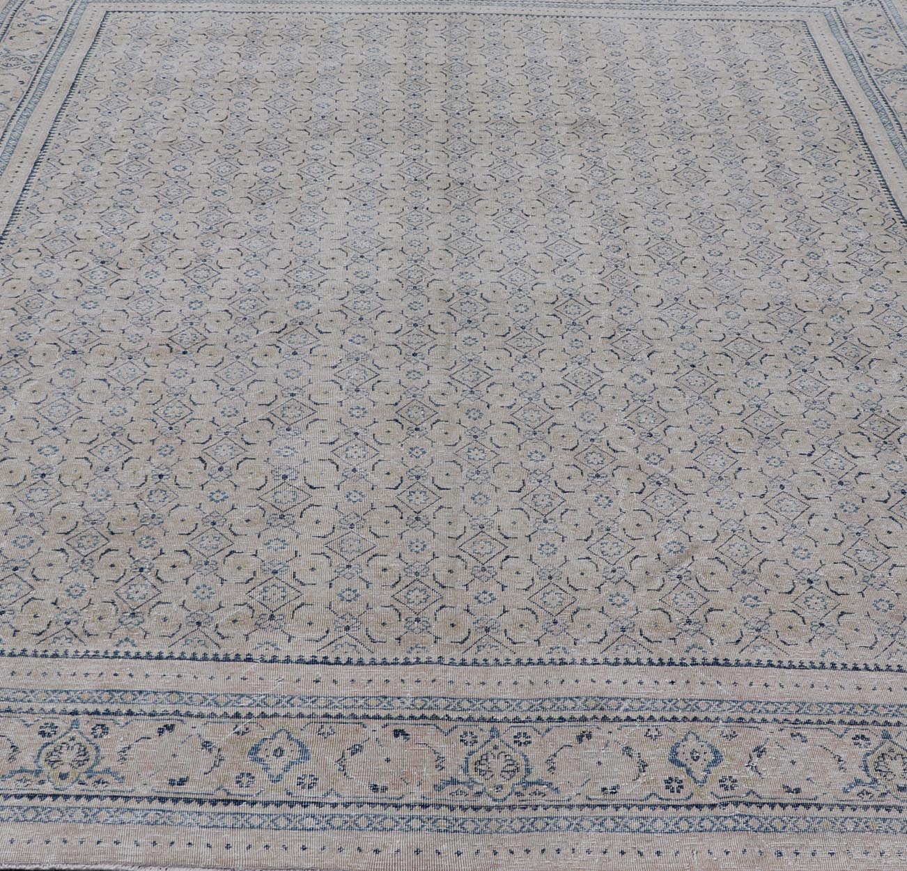 Measures: 10'2 x 13'6 Antique Persian Tabriz Rug with All - Over Small Tribal Design in Muted Tones. Keivan Woven Arts / rug EN - 15181, country of origin / type: Persian / Tabriz, circa Early - 20th century. This Tabriz rug features a relativ... - Keivan Woven ArtsEN - 15181 - 21883