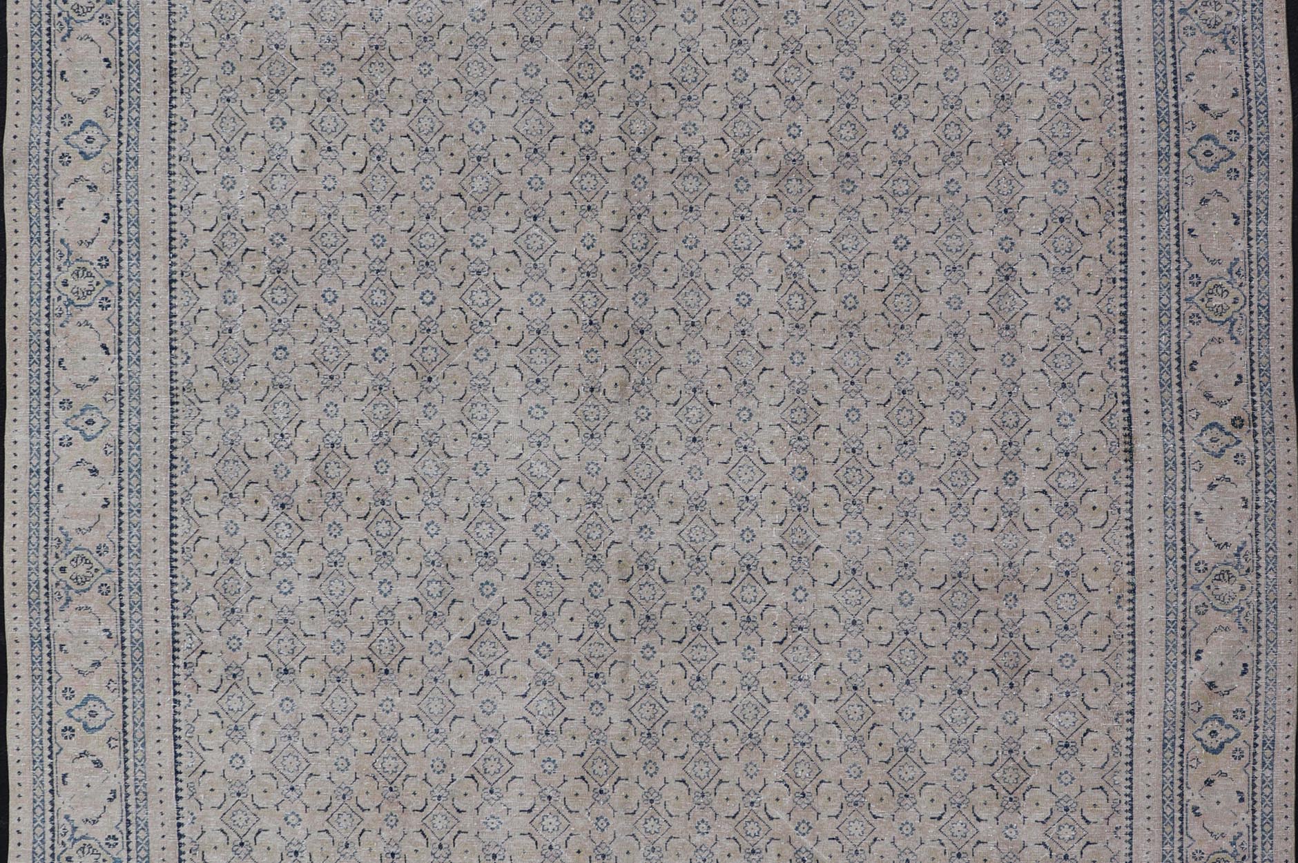 Measures: 10'2 x 13'6 Antique Persian Tabriz Rug with All - Over Small Tribal Design in Muted Tones. Keivan Woven Arts / rug EN - 15181, country of origin / type: Persian / Tabriz, circa Early - 20th century. This Tabriz rug features a relativ... - Keivan Woven ArtsEN - 15181 - 21883