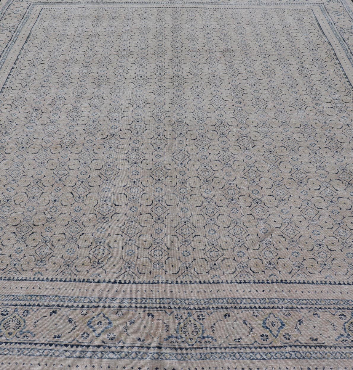 Measures: 10'2 x 13'6 Antique Persian Tabriz Rug with All - Over Small Tribal Design in Muted Tones. Keivan Woven Arts / rug EN - 15181, country of origin / type: Persian / Tabriz, circa Early - 20th century. This Tabriz rug features a relativ... - Keivan Woven ArtsEN - 15181 - 21883