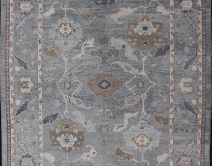 Measures: 10'7 x 14'7 Tribal Floral Design Hand Knotted Turkish Oushak Rug with Blues and Brown. rug EN - 15202, country of origin / type: Turkey / Oushak / Keivan Woven Arts This unique design Oushak rug from Turkey features a bold design wi... - Keivan Woven ArtsEN - 15202 - 22422Rug