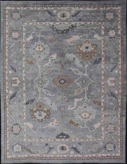 Measures: 10'7 x 14'7 Tribal Floral Design Hand Knotted Turkish Oushak Rug with Blues and Brown. rug EN - 15202, country of origin / type: Turkey / Oushak / Keivan Woven Arts This unique design Oushak rug from Turkey features a bold design wi... - Keivan Woven ArtsEN - 15202 - 22422Rug