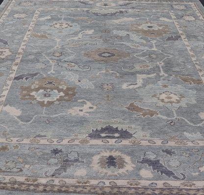 Measures: 10'7 x 14'7 Tribal Floral Design Hand Knotted Turkish Oushak Rug with Blues and Brown. rug EN - 15202, country of origin / type: Turkey / Oushak / Keivan Woven Arts This unique design Oushak rug from Turkey features a bold design wi... - Keivan Woven ArtsEN - 15202 - 22422Rug