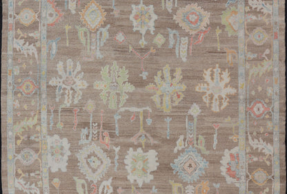 Measures: 13'4 x 17'6 Turkish Oushak Rug with All - Over Floral Design On A Light Brown Field. Keivan Woven Arts / rug EN - 15204, country of origin / type: Turkey / Oushak. This hand Knotted, hand spun wool Oushak rug from Turkey features a neu... - Keivan Woven ArtsEN - 15204 - 22866