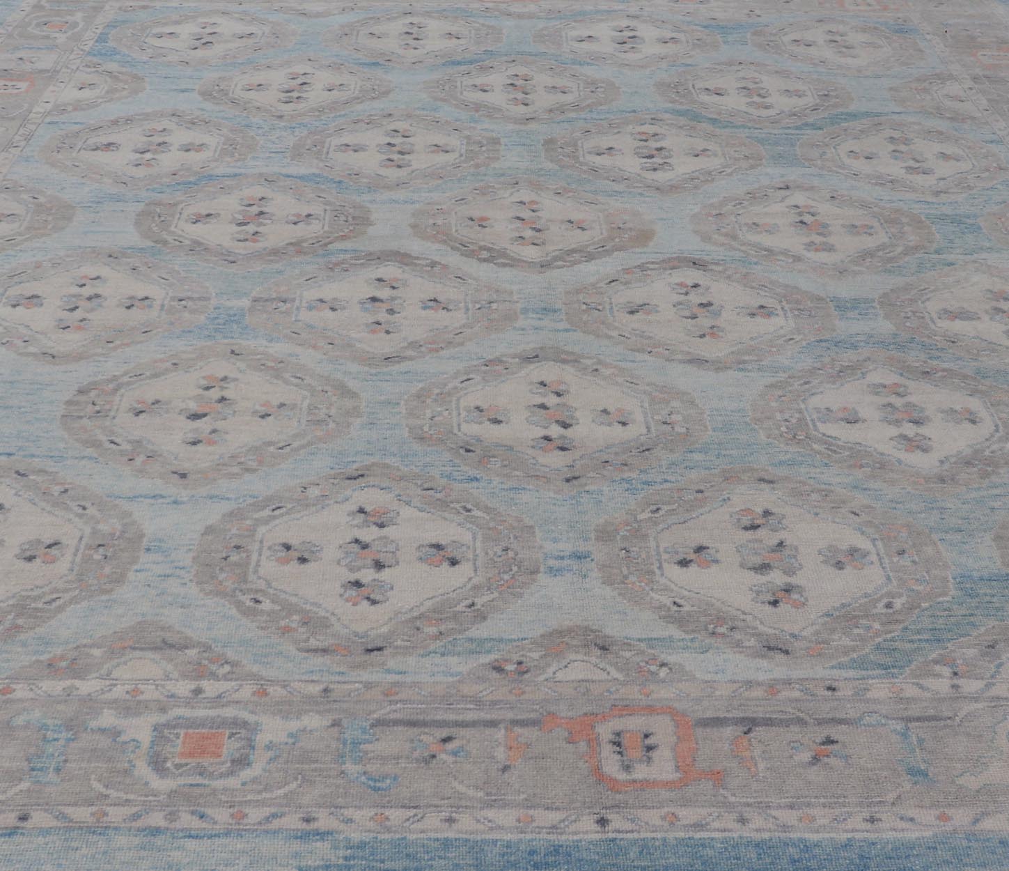 Measures: 13'9 x 17'6 All - Over Tribal Motifs Design Light Blue with Hints of Orange Turkish Oushak Rug. Keivan Woven Arts, rug EN - 15206, country of origin or type: Turkish Oushak This striking Turkish Oushak rug bears a light blue body that ... - Keivan Woven ArtsEN - 15206 - 22428Rug