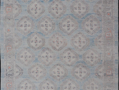 Measures: 13'9 x 17'6 All - Over Tribal Motifs Design Light Blue with Hints of Orange Turkish Oushak Rug. Keivan Woven Arts, rug EN - 15206, country of origin or type: Turkish Oushak This striking Turkish Oushak rug bears a light blue body that ... - Keivan Woven ArtsEN - 15206 - 22428Rug