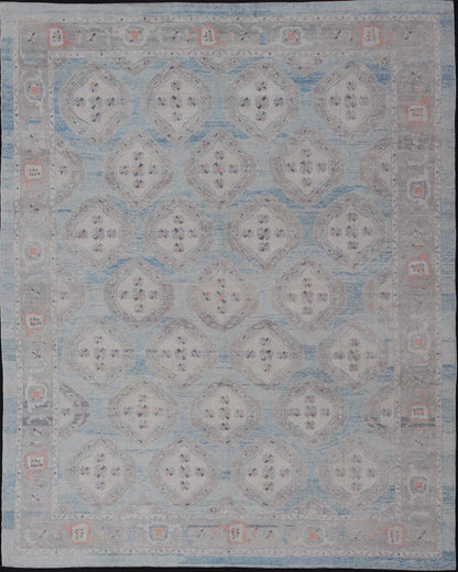 Measures: 13'9 x 17'6 All - Over Tribal Motifs Design Light Blue with Hints of Orange Turkish Oushak Rug. Keivan Woven Arts, rug EN - 15206, country of origin or type: Turkish Oushak This striking Turkish Oushak rug bears a light blue body that ... - Keivan Woven ArtsEN - 15206 - 22428Rug