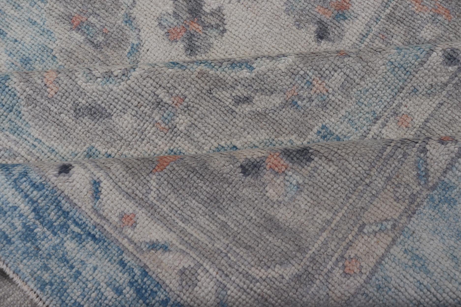 Measures: 13'9 x 17'6 All - Over Tribal Motifs Design Light Blue with Hints of Orange Turkish Oushak Rug. Keivan Woven Arts, rug EN - 15206, country of origin or type: Turkish Oushak This striking Turkish Oushak rug bears a light blue body that ... - Keivan Woven ArtsEN - 15206 - 22428Rug
