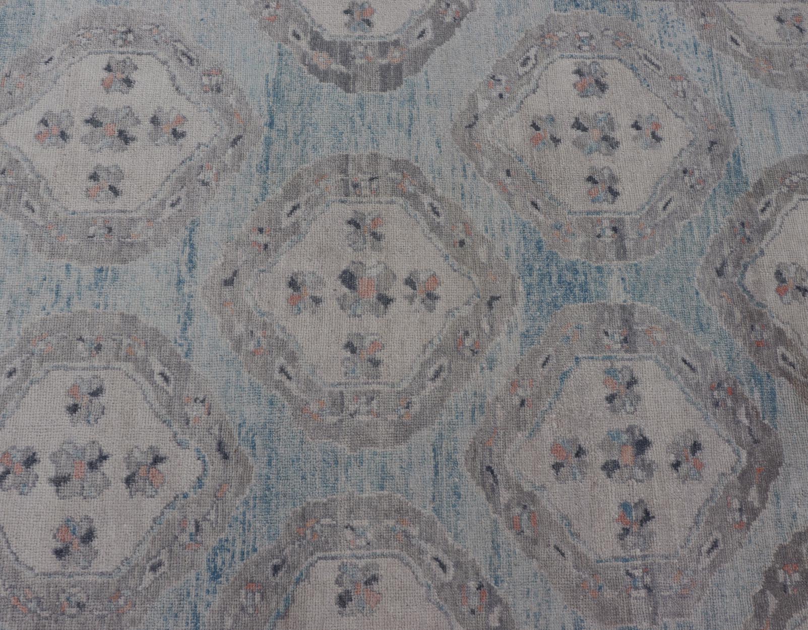 Measures: 13'9 x 17'6 All - Over Tribal Motifs Design Light Blue with Hints of Orange Turkish Oushak Rug. Keivan Woven Arts, rug EN - 15206, country of origin or type: Turkish Oushak This striking Turkish Oushak rug bears a light blue body that ... - Keivan Woven ArtsEN - 15206 - 22428Rug