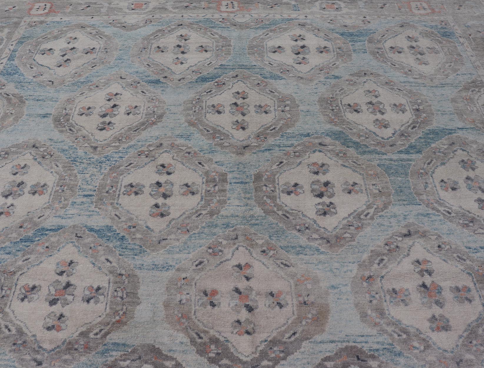 Measures: 13'9 x 17'6 All - Over Tribal Motifs Design Light Blue with Hints of Orange Turkish Oushak Rug. Keivan Woven Arts, rug EN - 15206, country of origin or type: Turkish Oushak This striking Turkish Oushak rug bears a light blue body that ... - Keivan Woven ArtsEN - 15206 - 22428Rug