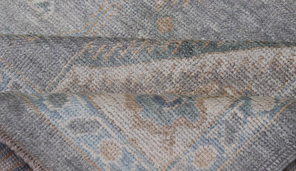 Measures: 7'3 x 10'4 Turkish Modern Oushak Rug in Medallion Design in Gray - Blue, and Marigold. Keivan Woven Arts / rug EN - 15208, country of origin / type: Turkey / Oushak This traditional Oushak rug from Turkey features a subdued, neutral co... - Keivan Woven ArtsEN - 15208 - 22416Rug