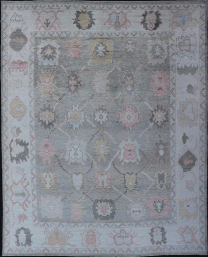 Measures: 9'0 x 11'9 Tribal Design Turkish Oushak Rug with Medallions in Light Green and Multi Colors. Keivan Woven Arts / rug EN - 15210, country of origin / type: Turkey / Oushak This unique design Oushak rug from Turkey features a bold desi... - Keivan Woven ArtsEN - 15210 - 21895Rug