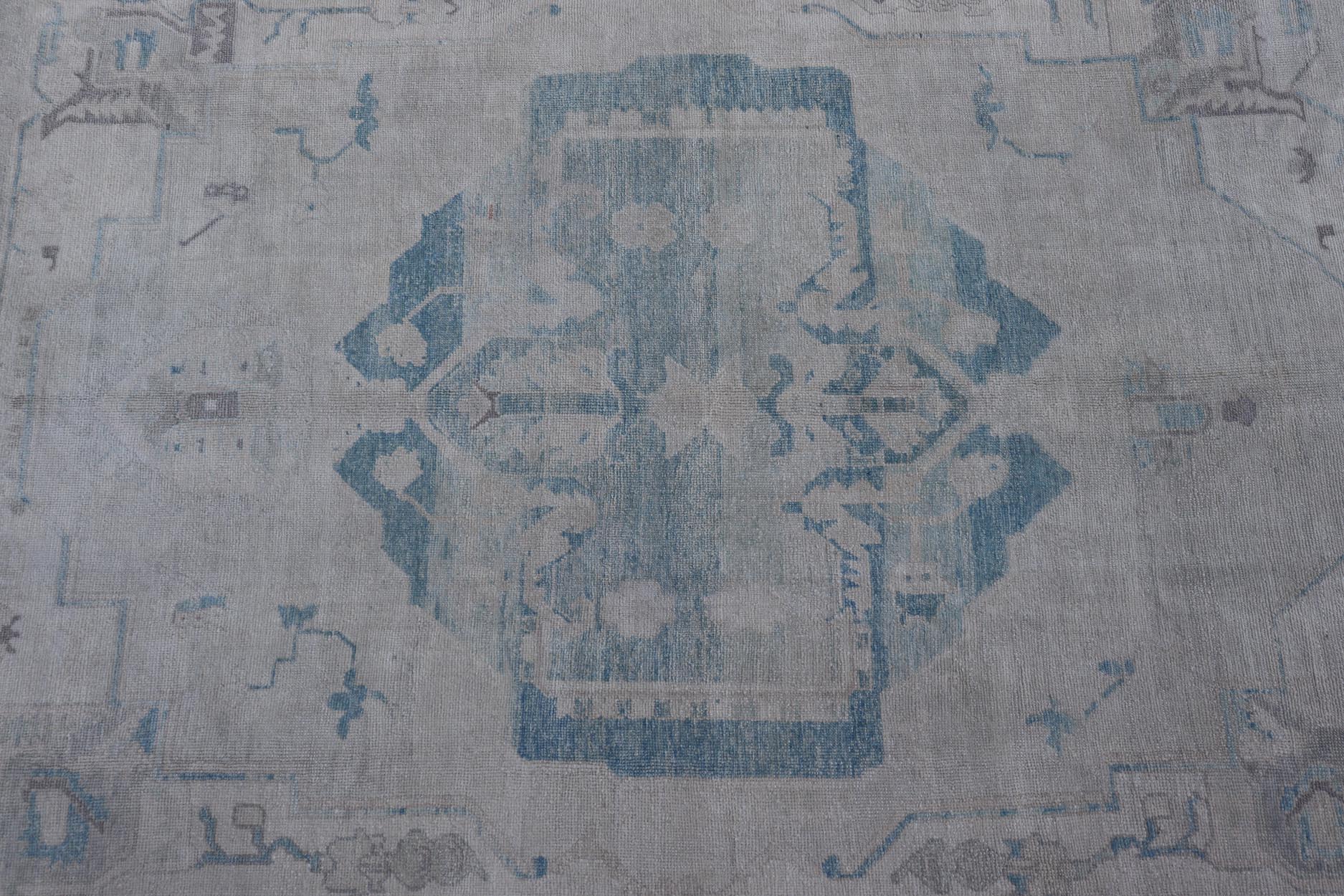 Measures: 10'0 x 13'3 Modern Turkish Oushak Large Medallion Rug in Light Blue and Cream. Keivan Woven Arts / rug EN - 15213, country of origin / type: Turkey / Oushak This traditional Oushak rug from Turkey features a subdued color palette and... - Keivan Woven ArtsEN - 15213 - 21901Rug