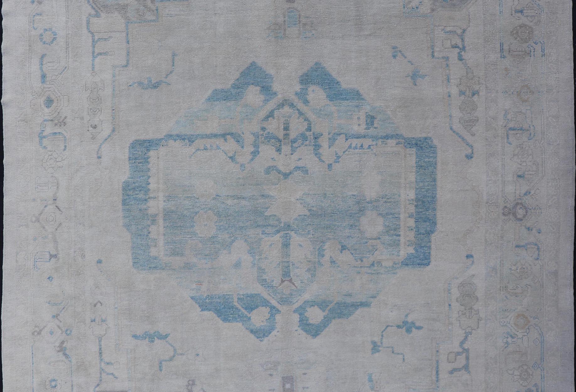 Measures: 10'0 x 13'3 Modern Turkish Oushak Large Medallion Rug in Light Blue and Cream. Keivan Woven Arts / rug EN - 15213, country of origin / type: Turkey / Oushak This traditional Oushak rug from Turkey features a subdued color palette and... - Keivan Woven ArtsEN - 15213 - 21901Rug