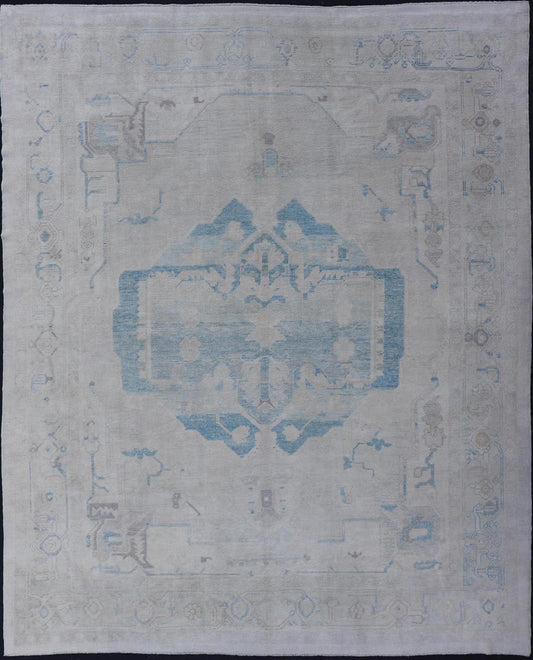 Measures: 10'0 x 13'3 Modern Turkish Oushak Large Medallion Rug in Light Blue and Cream. Keivan Woven Arts / rug EN - 15213, country of origin / type: Turkey / Oushak This traditional Oushak rug from Turkey features a subdued color palette and... - Keivan Woven ArtsEN - 15213 - 21901Rug