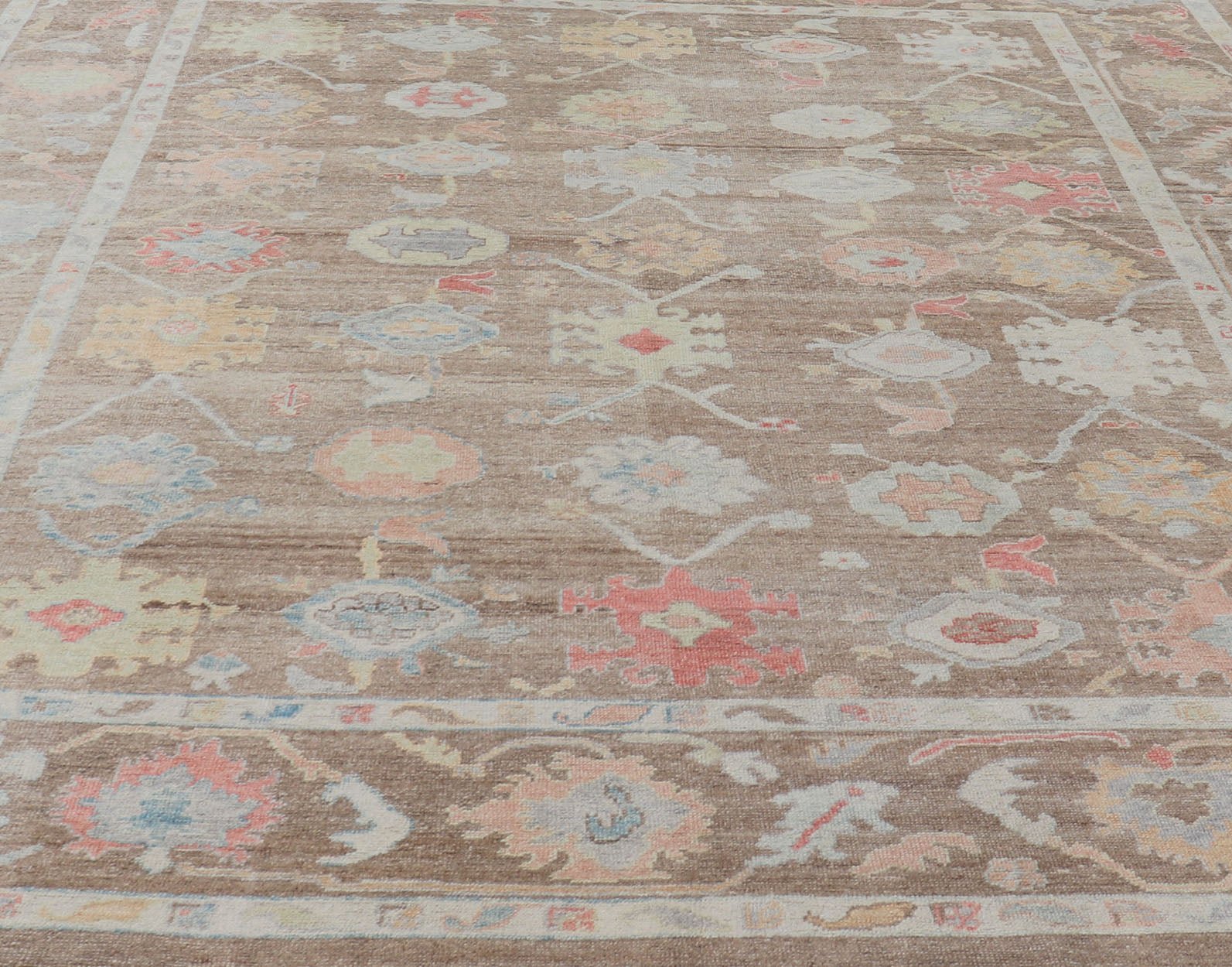 Measures: 12'0 x 15'0 Turkish Oushak Rug with All - Over Floral Design On A Light Brown Field. Keivan Woven Arts / rug EN - 15250, country of origin / type: Turkey / Oushak. This hand Knotted, hand spun wool Oushak rug from Turkey features a neu... - Keivan Woven ArtsEN - 15250 - 22884Rug