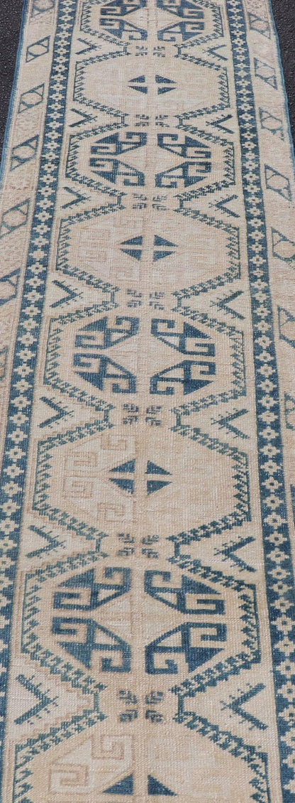 Vintage Oushak Turkish Runner with Geometric Design in Blue, Tan, and Blush. Keivan Woven Arts / rug EN - 15277 country of origin / type: Turkey / Oushak, circa 1940 Measures: 2'5 x 9'8 This vintage Turkish runner from Turkey features an... - Keivan Woven ArtsEN - 15277 - 23601Rug