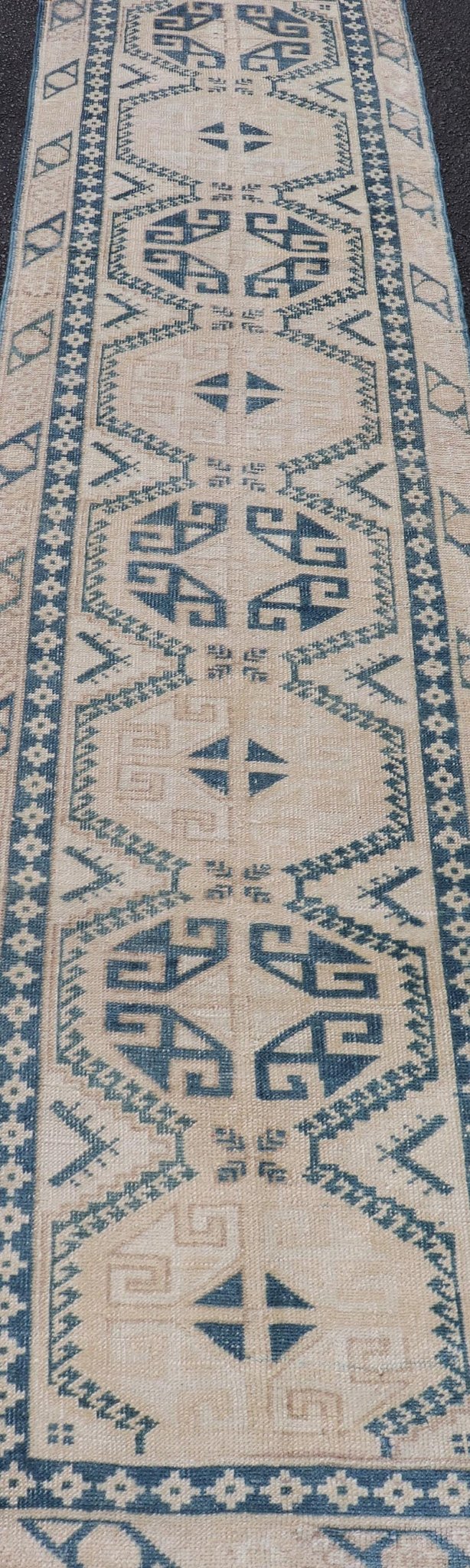 Vintage Oushak Turkish Runner with Geometric Design in Blue, Tan, and Blush. Keivan Woven Arts / rug EN - 15277 country of origin / type: Turkey / Oushak, circa 1940 Measures: 2'5 x 9'8 This vintage Turkish runner from Turkey features an... - Keivan Woven ArtsEN - 15277 - 23601Rug