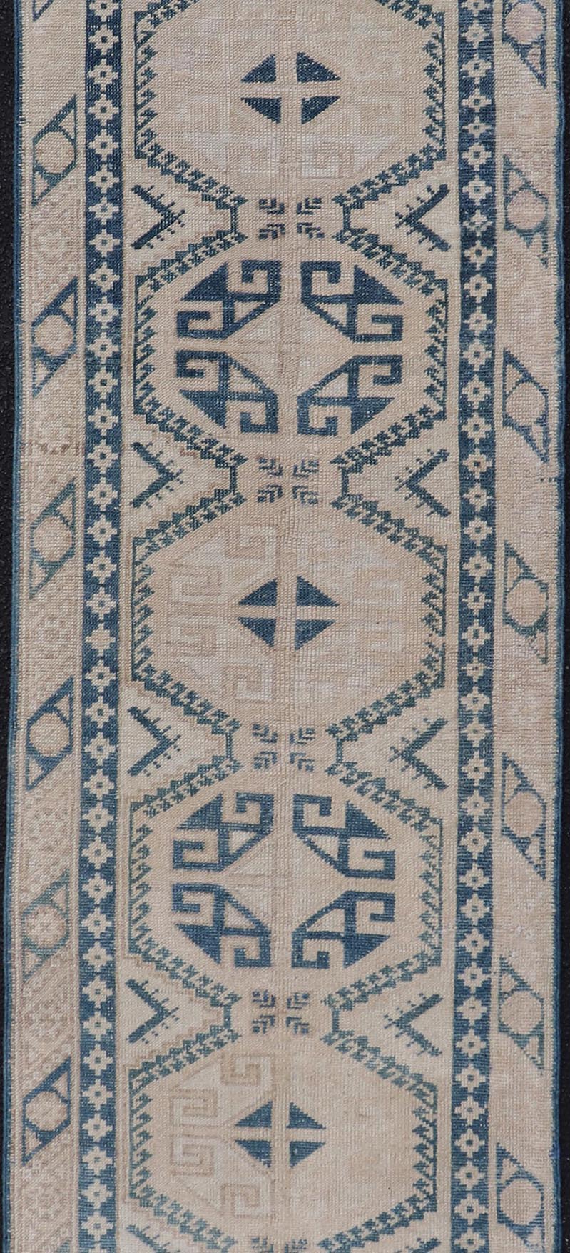 Vintage Oushak Turkish Runner with Geometric Design in Blue, Tan, and Blush. Keivan Woven Arts / rug EN - 15277 country of origin / type: Turkey / Oushak, circa 1940 Measures: 2'5 x 9'8 This vintage Turkish runner from Turkey features an... - Keivan Woven ArtsEN - 15277 - 23601Rug