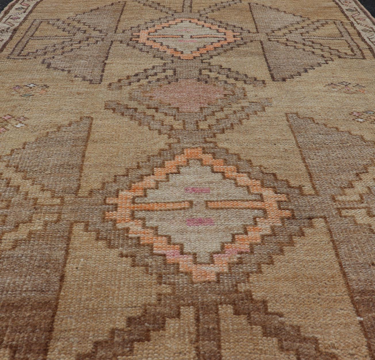 Colorful Turkish Kars with Tribal Medallion Designs and Geometric Motifs. Vintage Turkish in brown background and taupe border with accent colors, ornage, tan, cream, brown, and taupe. Keivan Woven Arts / rug /EN - 15296, country of origin / type: Turkey... - Keivan Woven ArtsEN - 15296 - 23678Rug