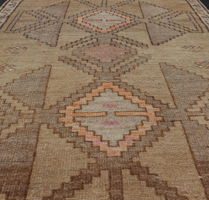 Colorful Turkish Kars with Tribal Medallion Designs and Geometric Motifs. Vintage Turkish in brown background and taupe border with accent colors, ornage, tan, cream, brown, and taupe. Keivan Woven Arts / rug /EN - 15296, country of origin / type: Turkey... - Keivan Woven ArtsEN - 15296 - 23678Rug