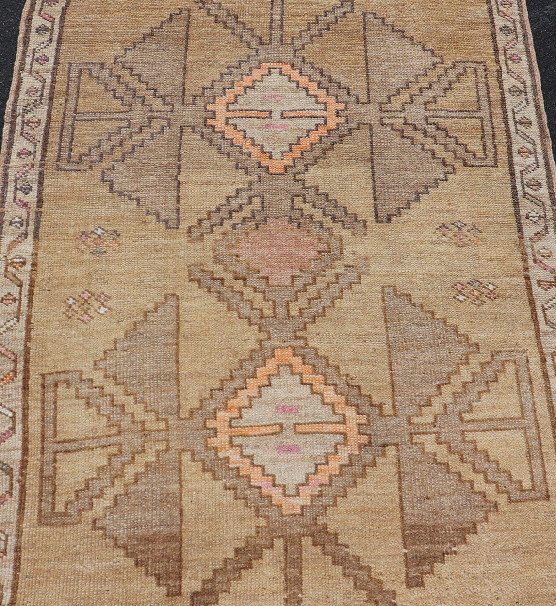 Colorful Turkish Kars with Tribal Medallion Designs and Geometric Motifs. Vintage Turkish in brown background and taupe border with accent colors, ornage, tan, cream, brown, and taupe. Keivan Woven Arts / rug /EN - 15296, country of origin / type: Turkey... - Keivan Woven ArtsEN - 15296 - 23678Rug