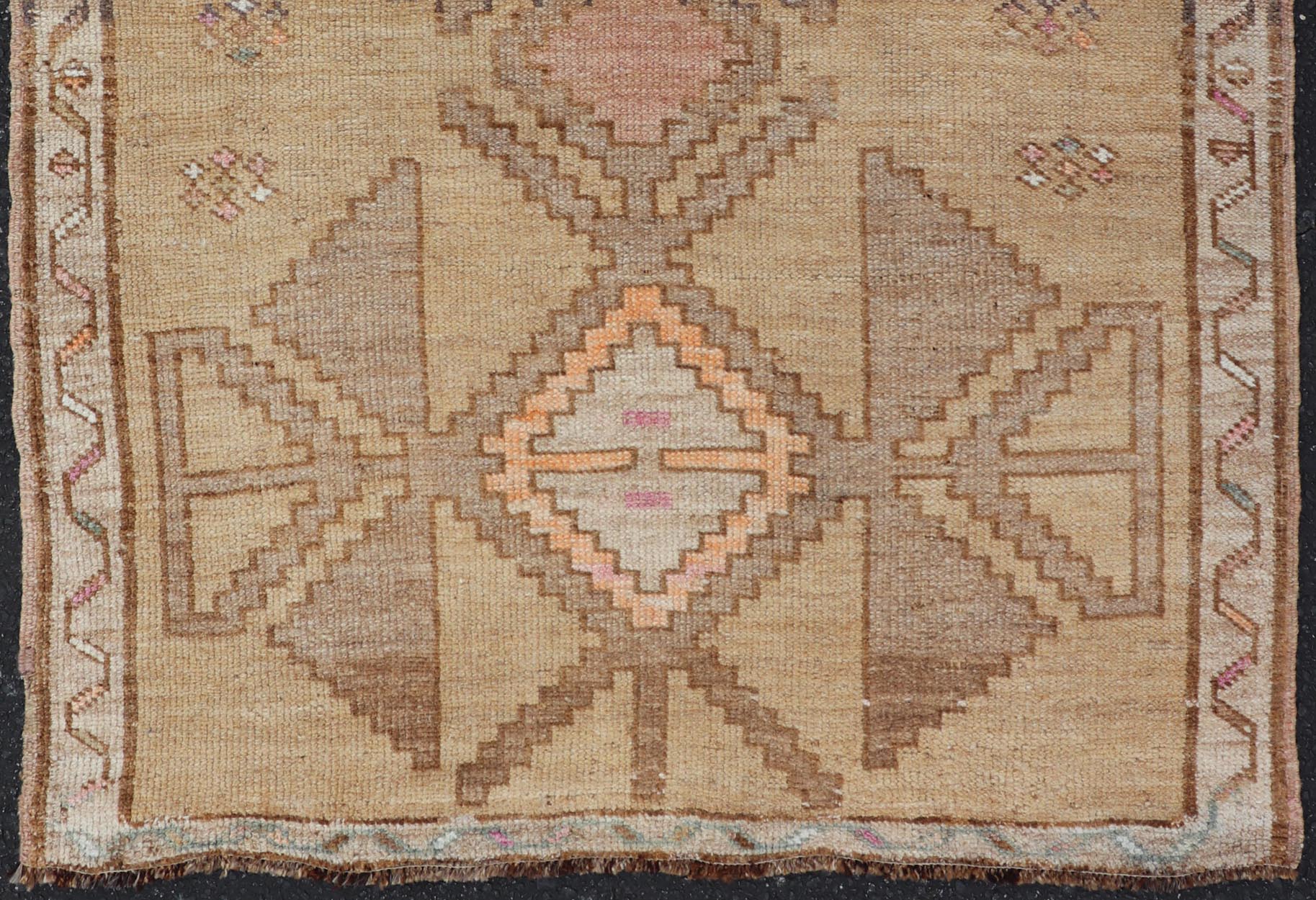 Colorful Turkish Kars with Tribal Medallion Designs and Geometric Motifs. Vintage Turkish in brown background and taupe border with accent colors, ornage, tan, cream, brown, and taupe. Keivan Woven Arts / rug /EN - 15296, country of origin / type: Turkey... - Keivan Woven ArtsEN - 15296 - 23678Rug