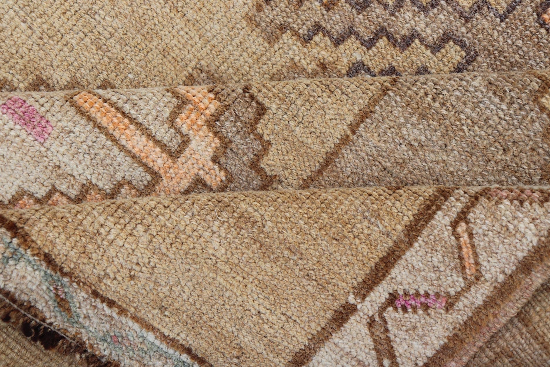 Colorful Turkish Kars with Tribal Medallion Designs and Geometric Motifs. Vintage Turkish in brown background and taupe border with accent colors, ornage, tan, cream, brown, and taupe. Keivan Woven Arts / rug /EN - 15296, country of origin / type: Turkey... - Keivan Woven ArtsEN - 15296 - 23678Rug