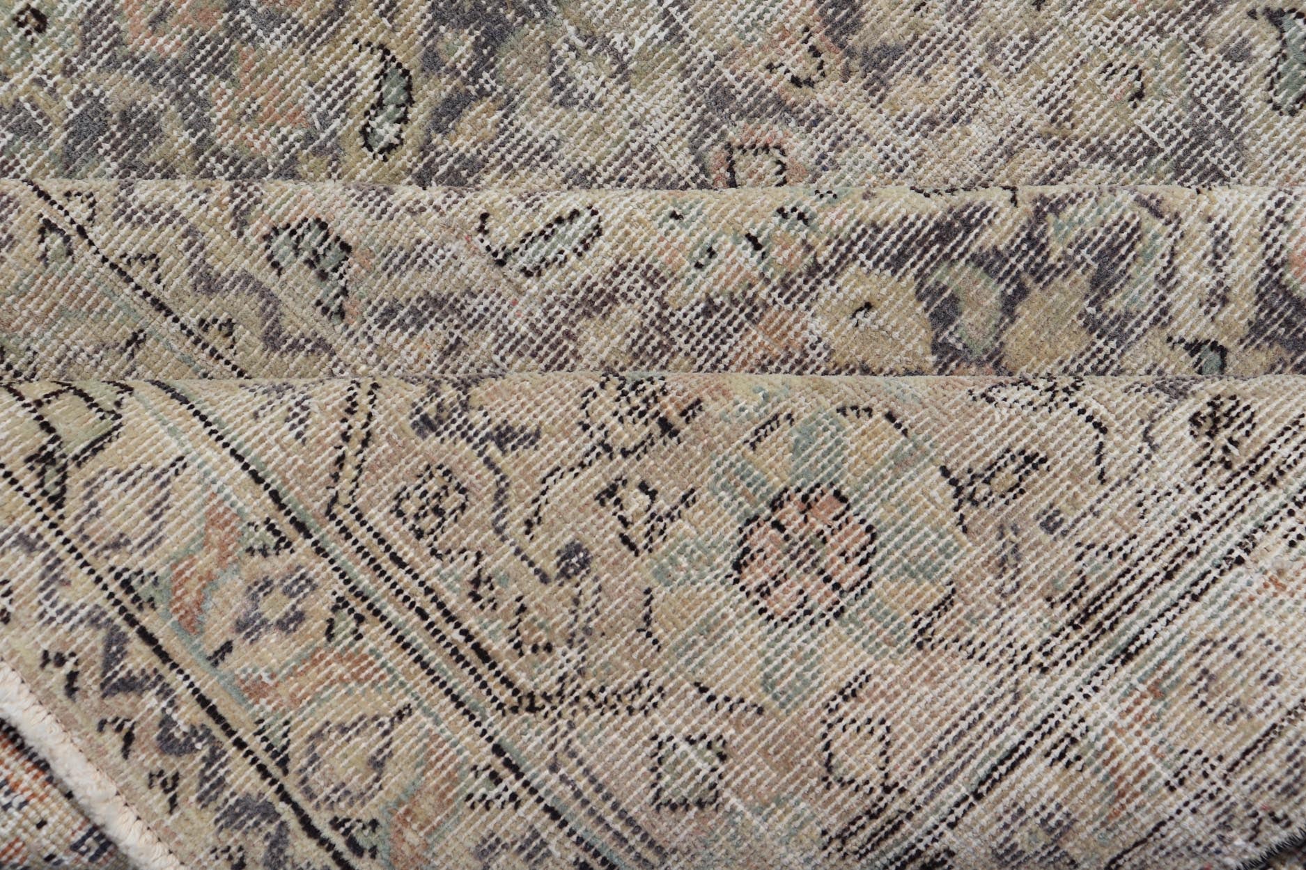All - Over Vintage Turkish Distressed Rug in Cream, Lavender, Taupe, and Green. Keivan Woven Arts / rug EN - 15415, country of origin / type: Turkey / Oushak, circa 1950. Measures: 7'9 x 11'2 This distressed rug Turkish vintage rug bears... - Keivan Woven ArtsEN - 15415 - 23690Rug