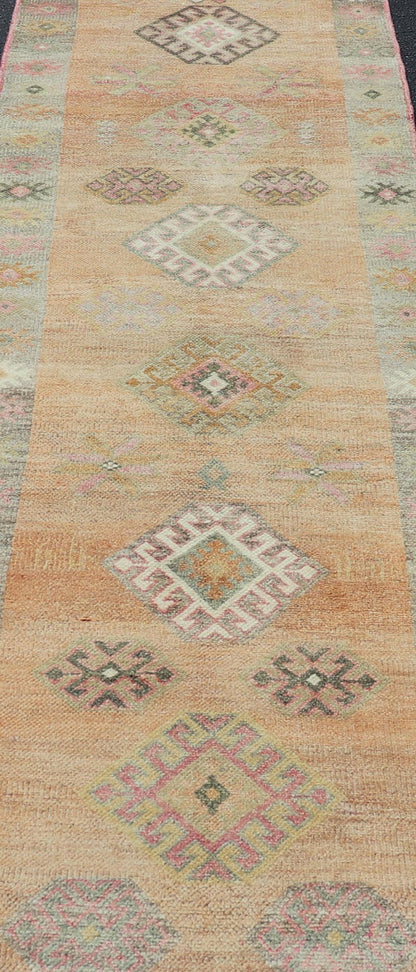Vintage Tulu Runner in Geometric shapes and soft tones by Keivan Woven Arts Measures: 2'11 X 12'8 This Turkish Tulu runner features a series of geometric motifs and patterns by Keivan Woven Arts, rug number EN - 15519. The vintage Tulu run... - Keivan Woven ArtsEN - 15519 - 26532Rug