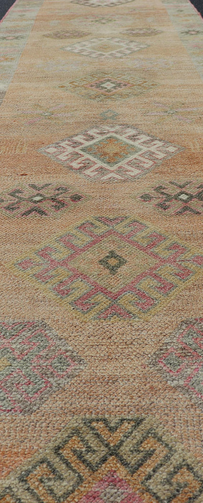 Vintage Tulu Runner in Geometric shapes and soft tones by Keivan Woven Arts Measures: 2'11 X 12'8 This Turkish Tulu runner features a series of geometric motifs and patterns by Keivan Woven Arts, rug number EN - 15519. The vintage Tulu run... - Keivan Woven ArtsEN - 15519 - 26532Rug