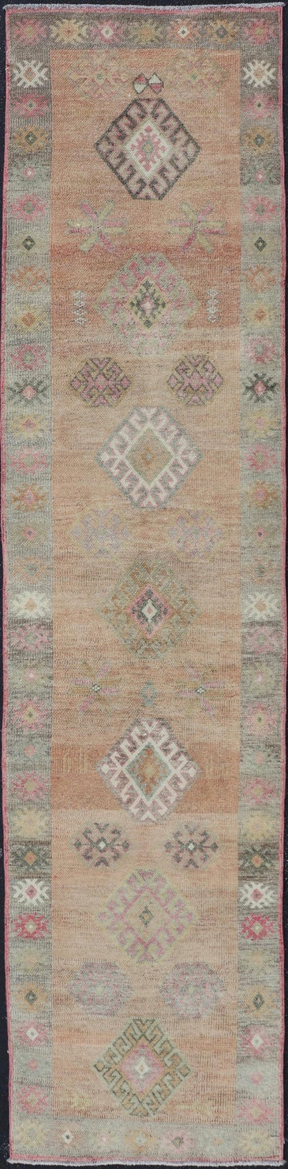 Vintage Tulu Runner in Geometric shapes and soft tones by Keivan Woven Arts Measures: 2'11 X 12'8 This Turkish Tulu runner features a series of geometric motifs and patterns by Keivan Woven Arts, rug number EN - 15519. The vintage Tulu run... - Keivan Woven ArtsEN - 15519 - 26532Rug