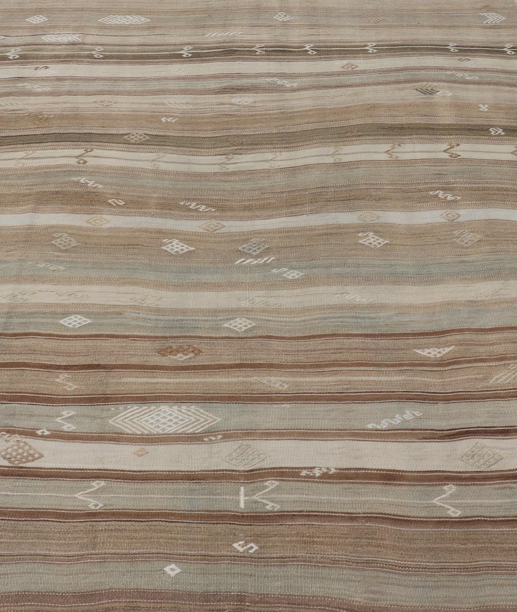 Vintage Kilim With Subtle Striped Patterns in Earth Tones Measures: 6'4" x 7'10" This Vintage Turkish Kilim showcases a flat weave with subtle patterns scattered across horizontal stripes. The kilim is decorated with shades of beige, bro... - Keivan Woven ArtsEN - 15524 - 25853Rug