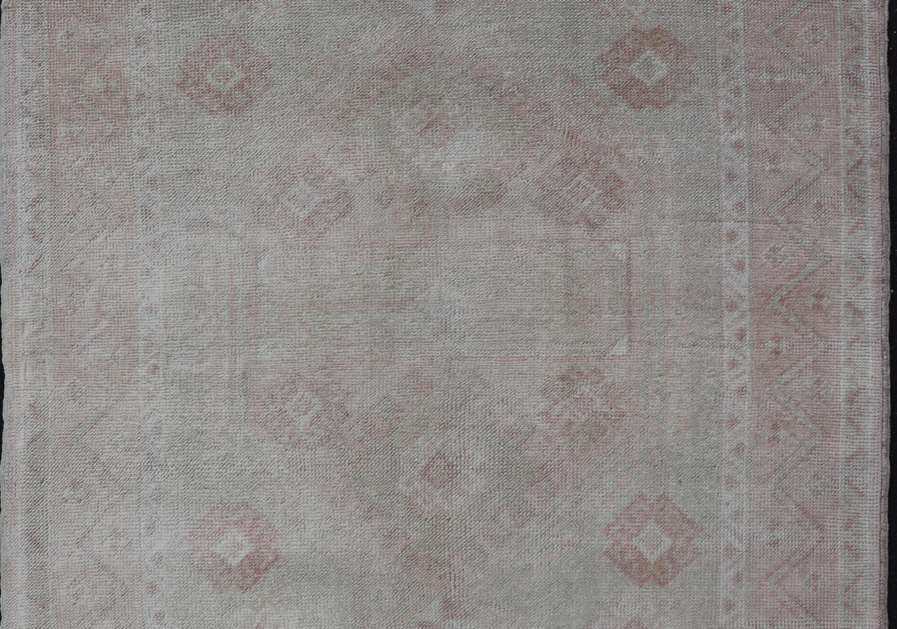 Oushak Vintage Rug with Pastel Colors in Tan, Green, Butter Yellow, and Peach. Keivan Woven Arts, Rug EN - 15526, country of origin / type: Turkey / Oushak, circa mid - 20th century. Measures: 4'6 x 6'0 This vintage Turkish Oushak rug (circa mid... - Keivan Woven ArtsEN - 15526 - 23833Rug