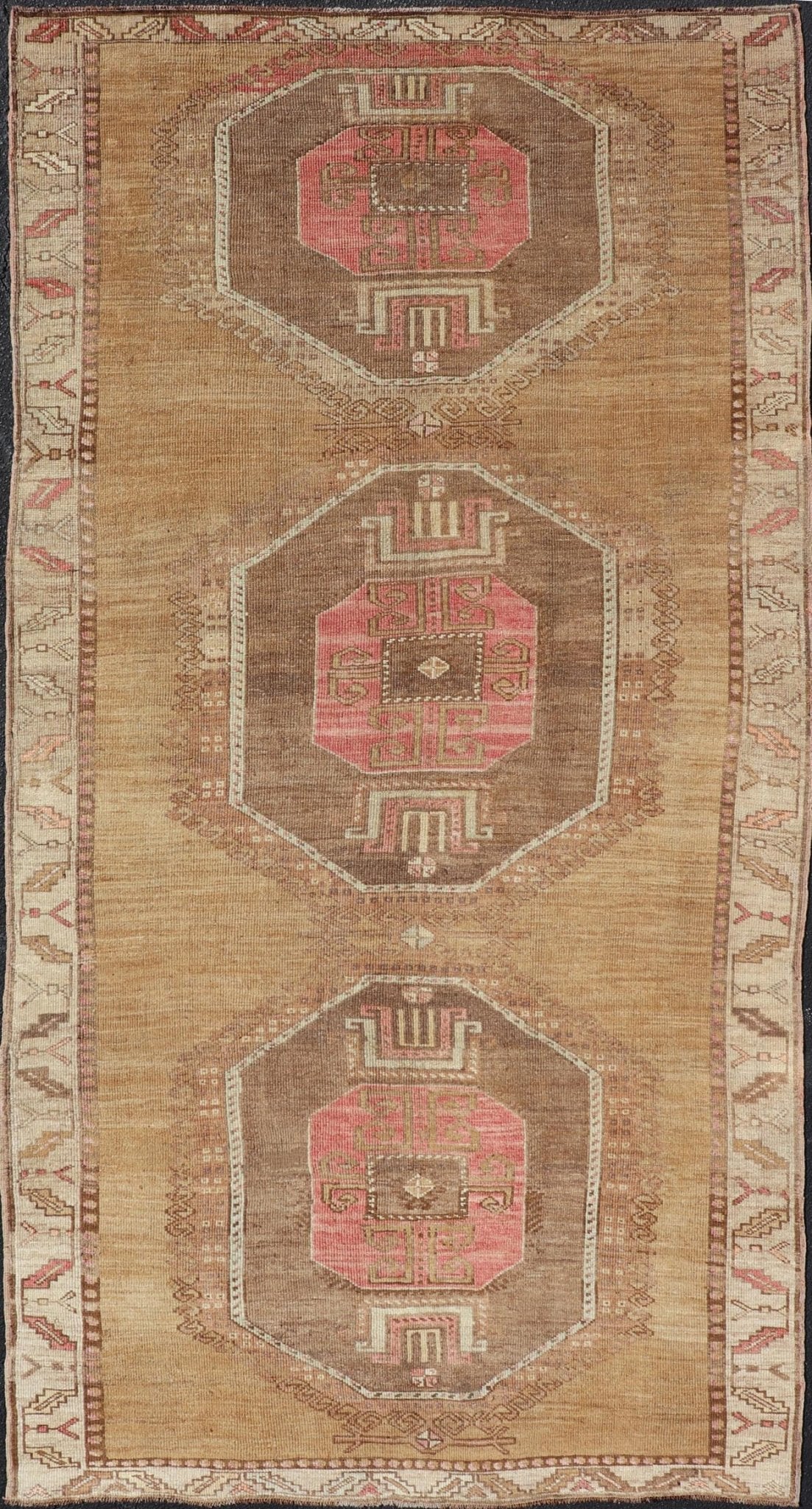 Vintage Turkish Kars wide Gallery Rug With Geometric Medallions by Keivan Woven Arts This Gallery Kars rug showcases three large, octagonal medallions aligned vertically along the length of the Turkish Kars runner. This wide gallery runner is ... - Keivan Woven ArtsEN - 15537 - 26544Rug