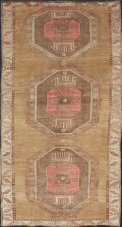 Vintage Turkish Kars wide Gallery Rug With Geometric Medallions by Keivan Woven Arts This Gallery Kars rug showcases three large, octagonal medallions aligned vertically along the length of the Turkish Kars runner. This wide gallery runner is ... - Keivan Woven ArtsEN - 15537 - 26544Rug