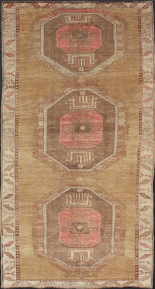 Vintage Turkish Kars wide Gallery Rug With Geometric Medallions by Keivan Woven Arts This Gallery Kars rug showcases three large, octagonal medallions aligned vertically along the length of the Turkish Kars runner. This wide gallery runner is ... - Keivan Woven ArtsEN - 15537 - 26544Rug