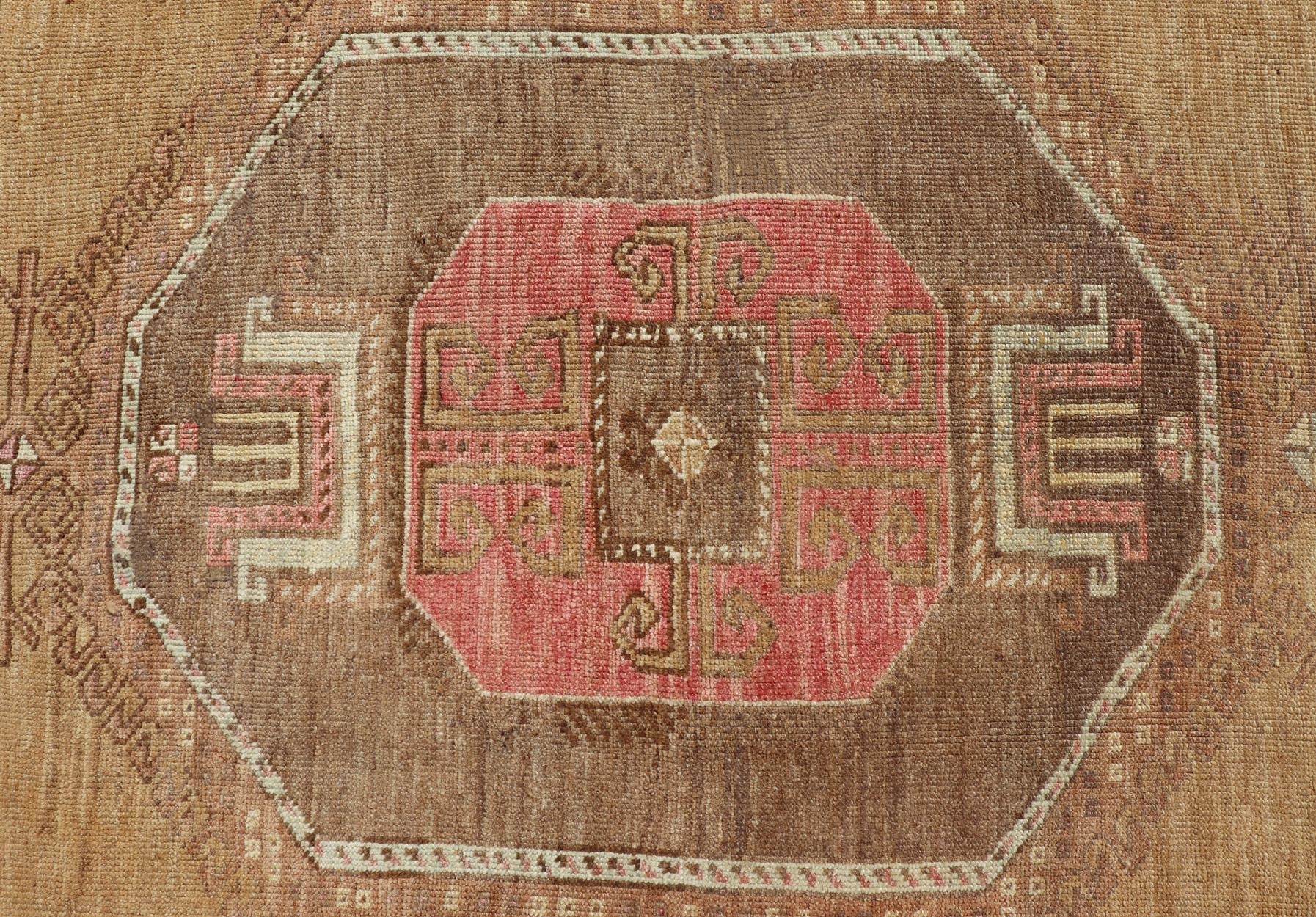 Vintage Turkish Kars wide Gallery Rug With Geometric Medallions by Keivan Woven Arts This Gallery Kars rug showcases three large, octagonal medallions aligned vertically along the length of the Turkish Kars runner. This wide gallery runner is ... - Keivan Woven ArtsEN - 15537 - 26544Rug